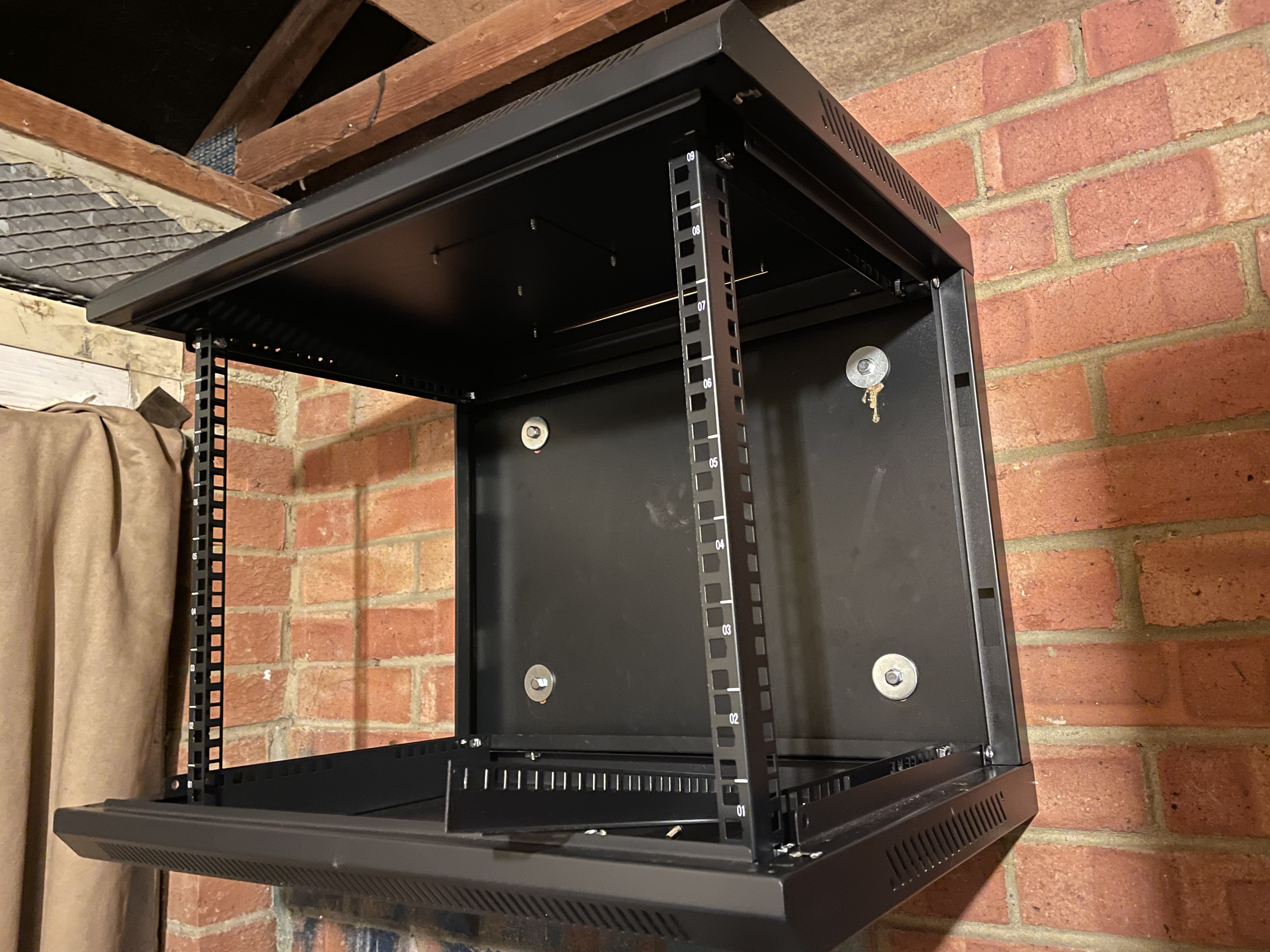 Photo of rack case mounted to the wall